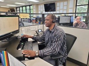 Roy Suber, an education counselor with the Navy College Virtual Education Center (NCVEC), assists a Sailor over the phone with his education needs. Navy College Program counselors are available to assist Sailors on their education journey by calling the 24-hour, toll-free MyNavy Career Center phone number: 1-833-330-MNCC. To reach the NCVEC, select “Education and Training,” then “NCVEC.”