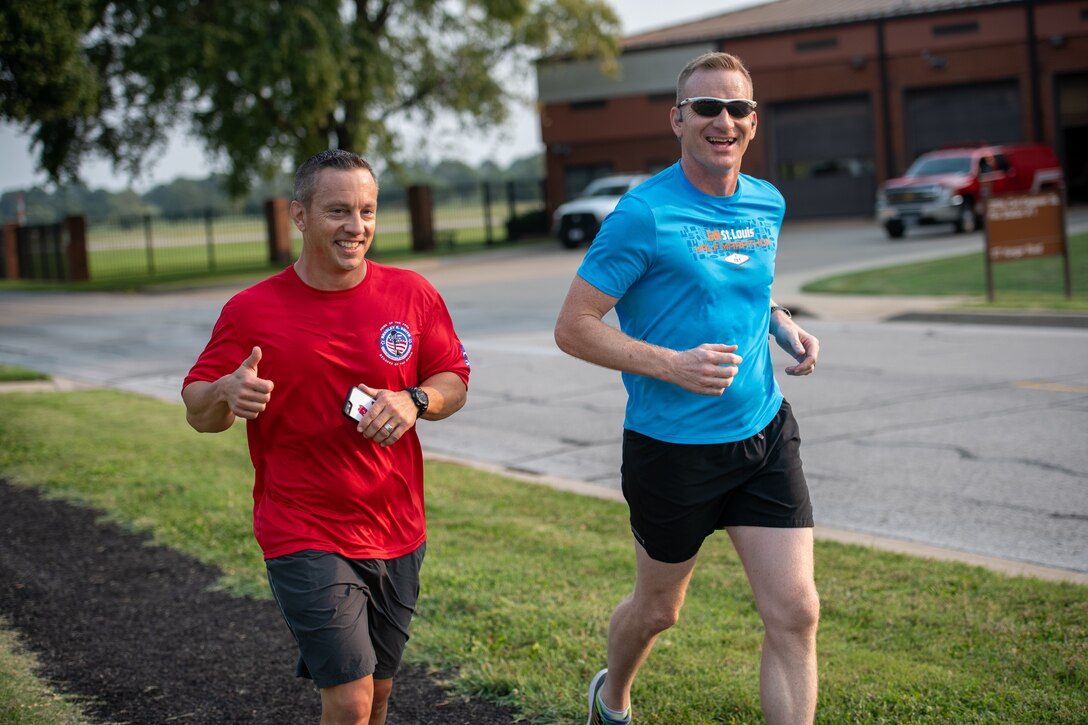 Airmen from the 73rd Airlift Squadron, 54th Airlift Squadron and 932nd Operations Support Flight virtually participate in the Bradley R. Smith memorial scholarship 5k run, 9 Sept. 2021, Scott Air Force Base, Illinois.