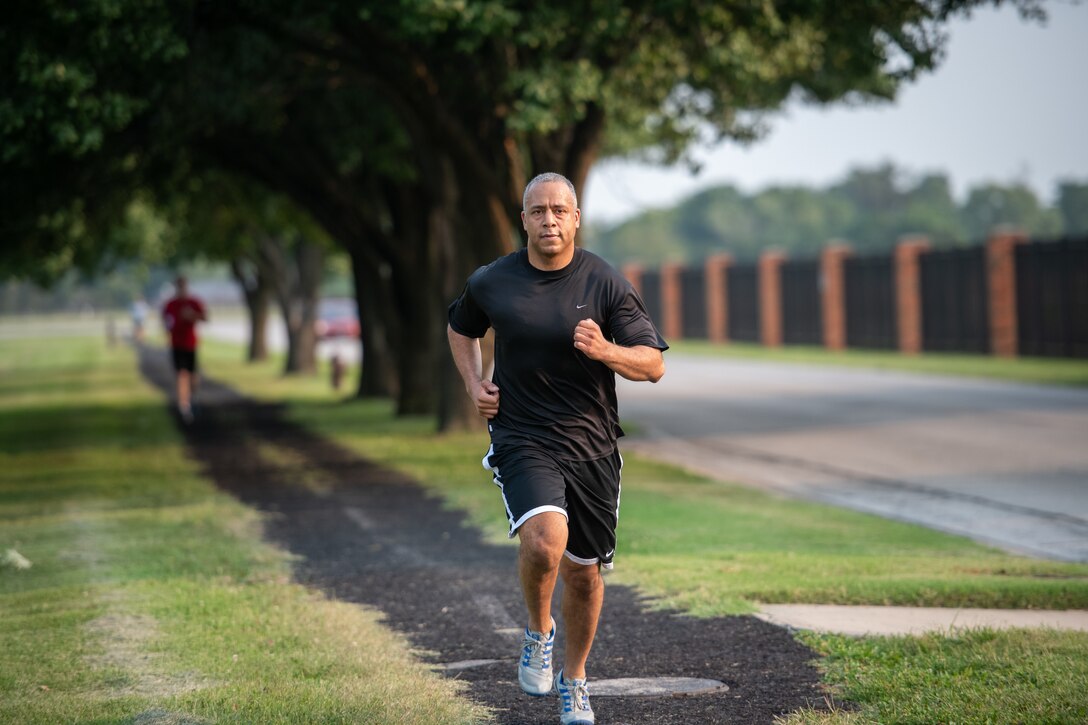 Airmen from the 73rd Airlift Squadron, 54th Airlift Squadron and 932nd Operations Support Flight virtually participate in the Bradley R. Smith memorial scholarship 5k run, 9 Sept. 2021, Scott Air Force Base, Illinois.