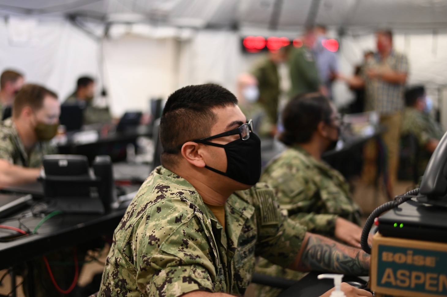 Operations Specialist 2nd Class Vincent Hernandez stands watch at U.S. 3rd Fleet’s expeditionary maritime operations center (EMOC), forward-based at Joint Base Pearl Harbor-Hickam, during Large-Scale Exercise (LSE) 2021.