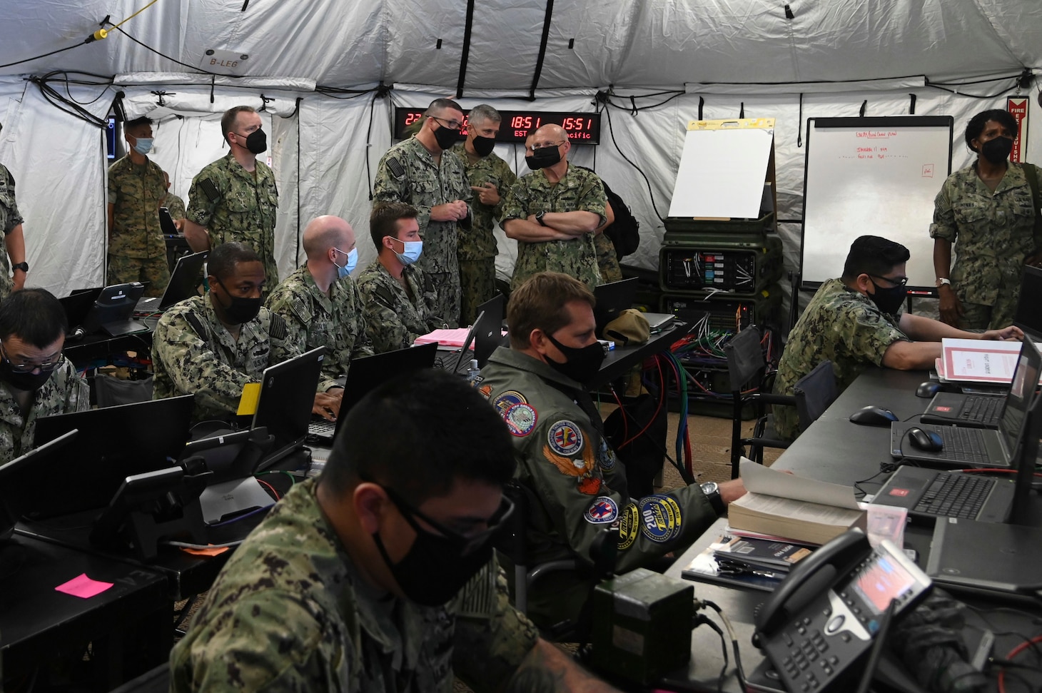 Commander of U.S. 3rd Fleet Vice Adm. Steve Koehler leads Chief of Naval Operations Adm. Mike Gilday on a tour of 3rd Fleet’s expeditionary maritime operations center at Joint Base Pearl Harbor-Hickam during Large-Scale Exercise (LSE) 2021, August 14.