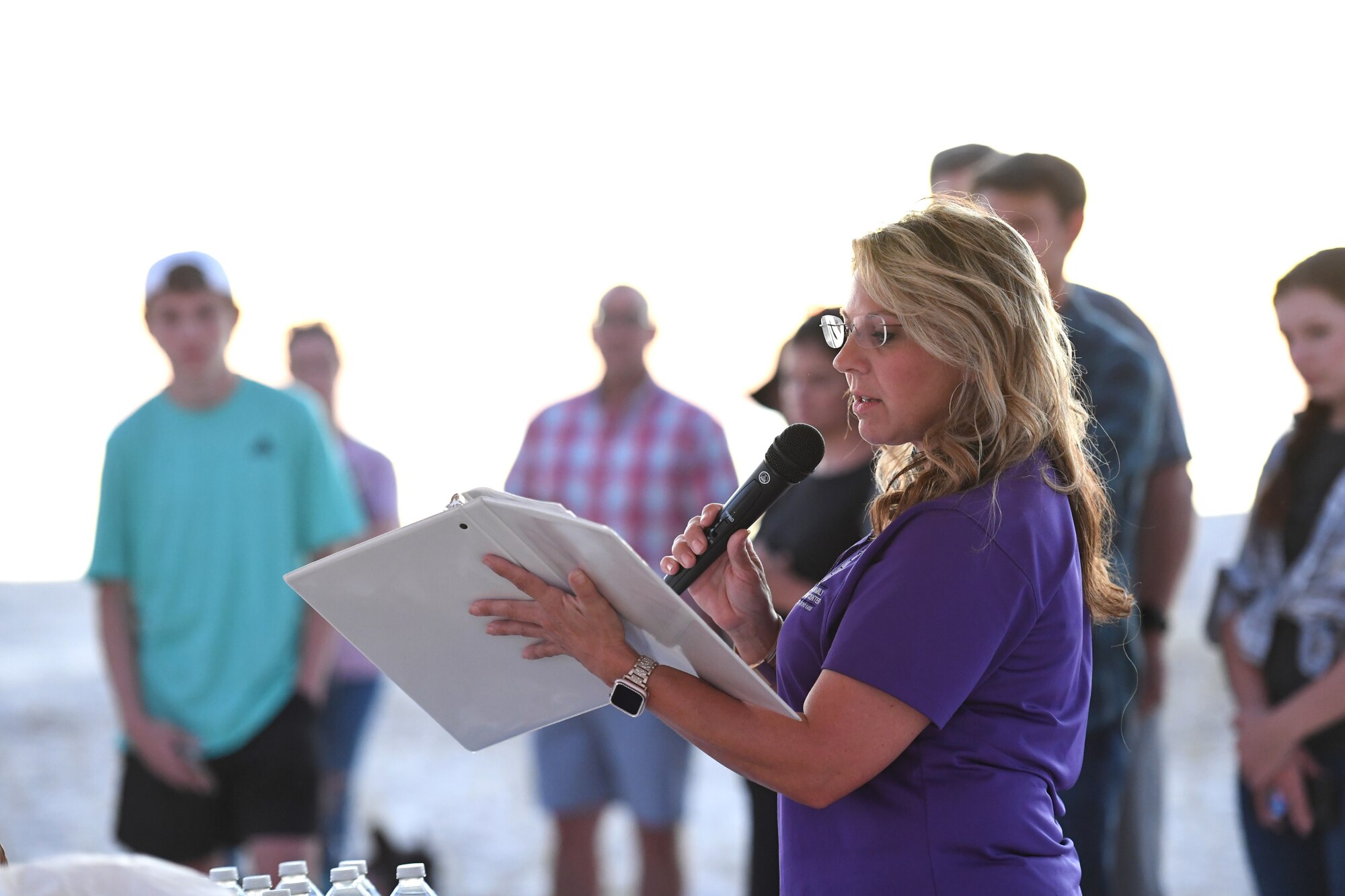 Holly Fisher, 81st Force Support Squadron work-life specialist, delivers remarks during the Air Force Families Forever Fallen Hero Sky Lantern Lighting on the Biloxi Beach, Mississippi, Sept. 24, 2021. The event, hosted by Keesler Air Force Base, included eco-friendly sky lanterns released in honor of fallen heroes. (U.S. Air Force photo by Kemberly Groue)