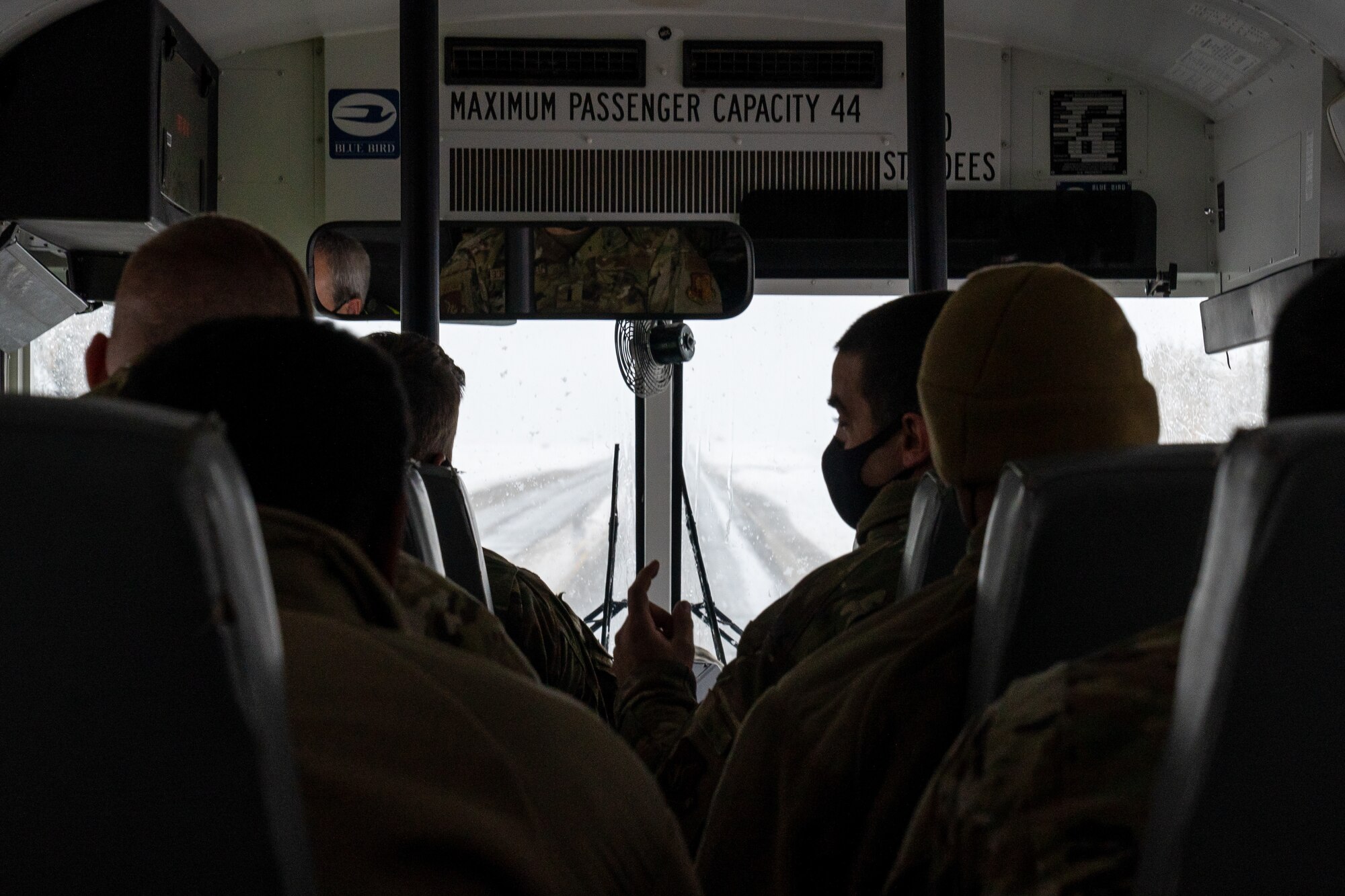 Airmen assigned to the 773d Civil Engineer Squadron return from the firing range after an early-season snowfall cancelled their scheduled training day.
