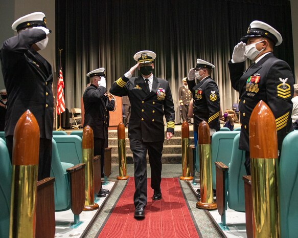 Capt. John Cage, commander, Submarine Squadron 20, is saluted by sideboys during a change of command ceremony held at Naval Undersea Museum in Keyport, Washington Sept. 9, 2021. During the ceremony, Cmdr. Travis Wood relieved Cmdr. Robert Garis as commanding officer of USS Maine (SSBN 741) Gold Crew. (U.S. Navy Photo by Mass Communication Specialist 2nd Class Emilia C. Hilliard)