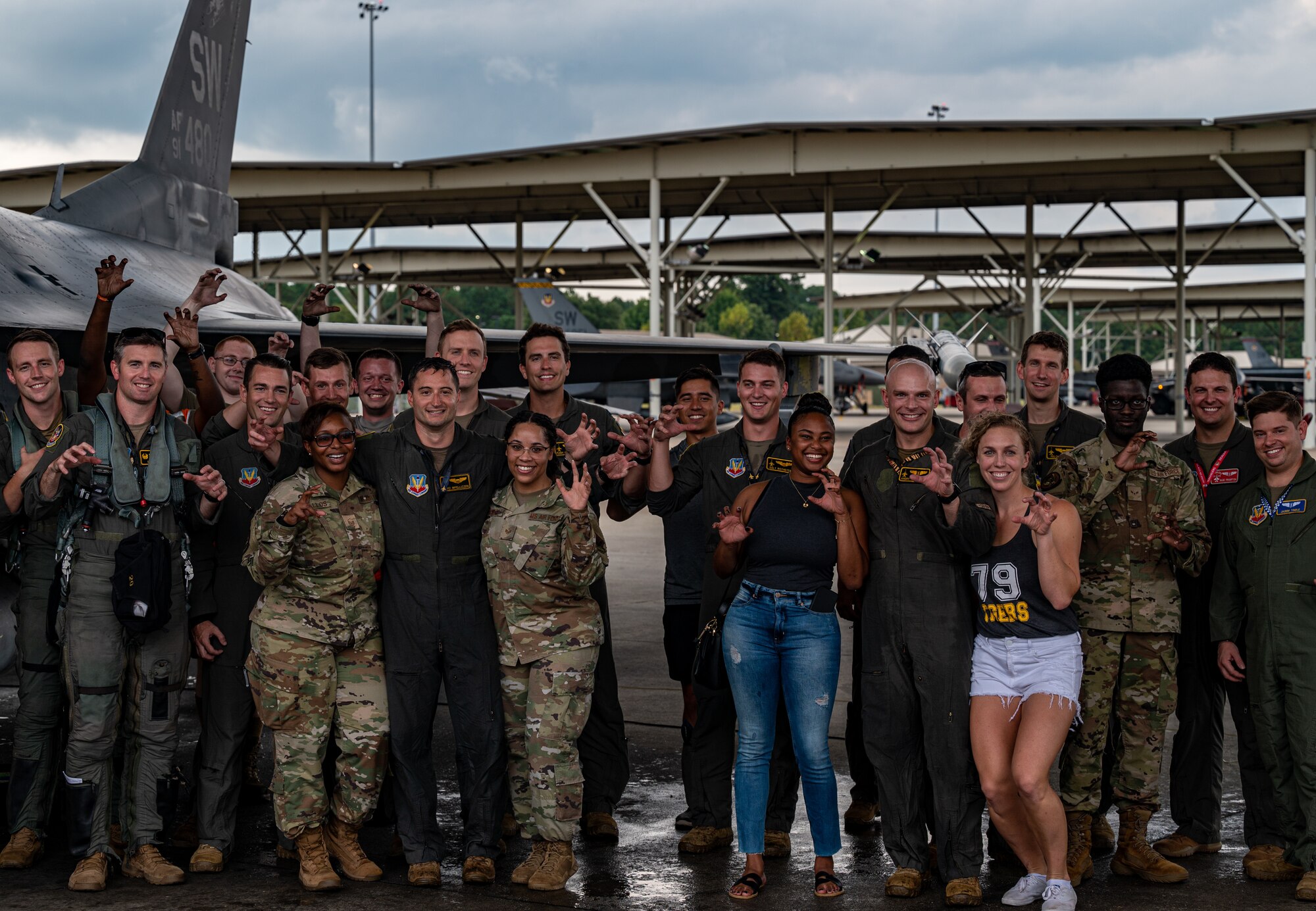 Photo of a group of Airmen and their families