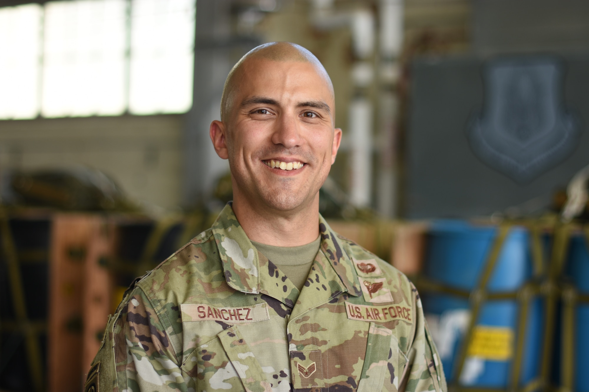 Man stands in front of cargo.