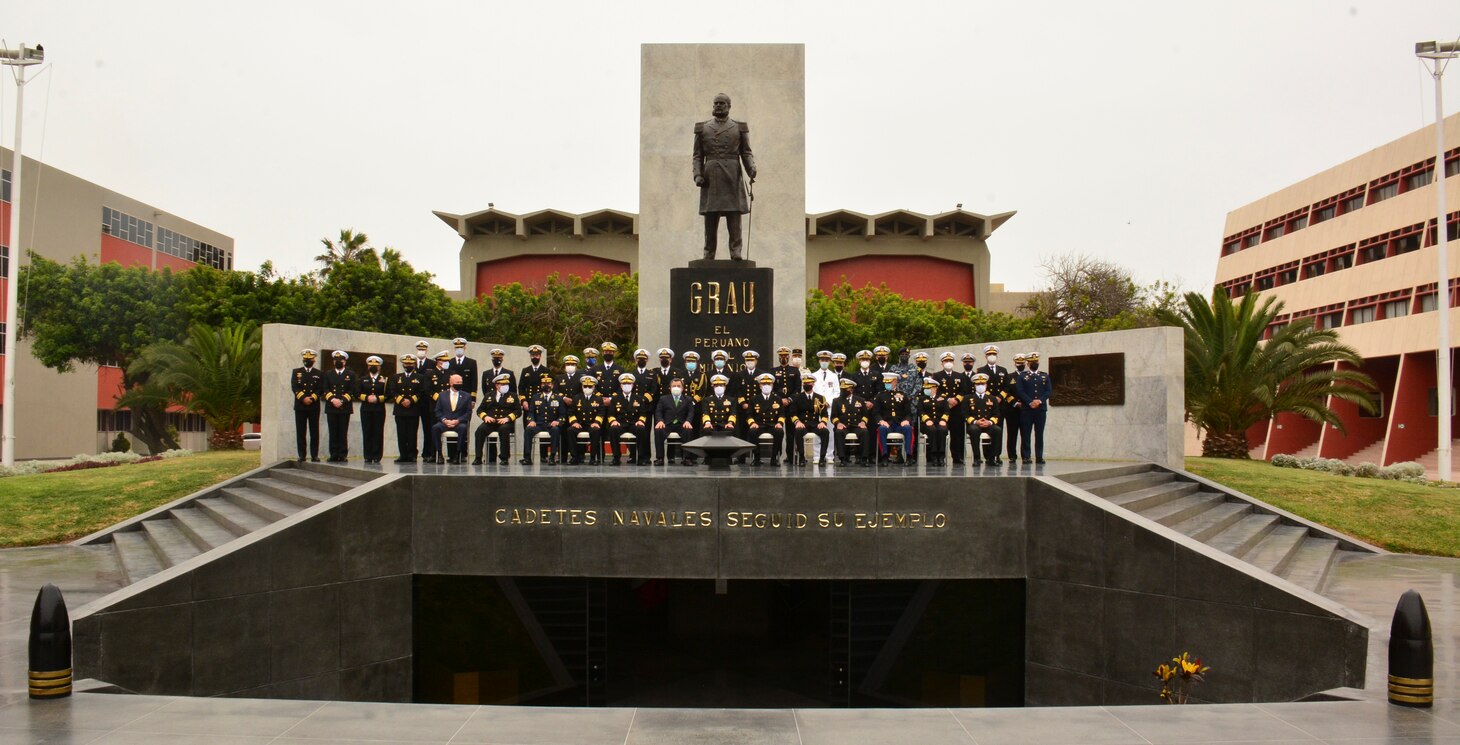 Multinational service members pose for a photo following the opening ceremony for UNITAS LXII at the Peruvian Naval Academy, Sept. 27, 2021.