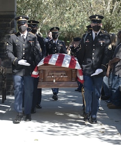 New York Army National Guard Capt. Eric Samson, left, presents the American flag to Douglas Smead, brother of Korean War MIA Cpl. Walter Smead, as part of the military honors for Smead’s funeral ceremony Sept. 20, 2021, at the Gerald B.H. Solomon Saratoga National Cemetery in Schuylerville, N.Y. Smead returned home after 71 years listed as missing in action following his death in North Korea near the Chosin Reservoir in December 1950.