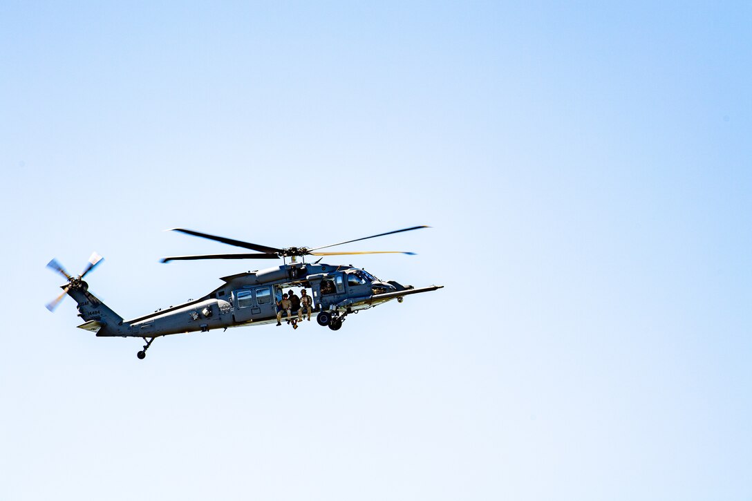 Photo of helicopter flying through the sky