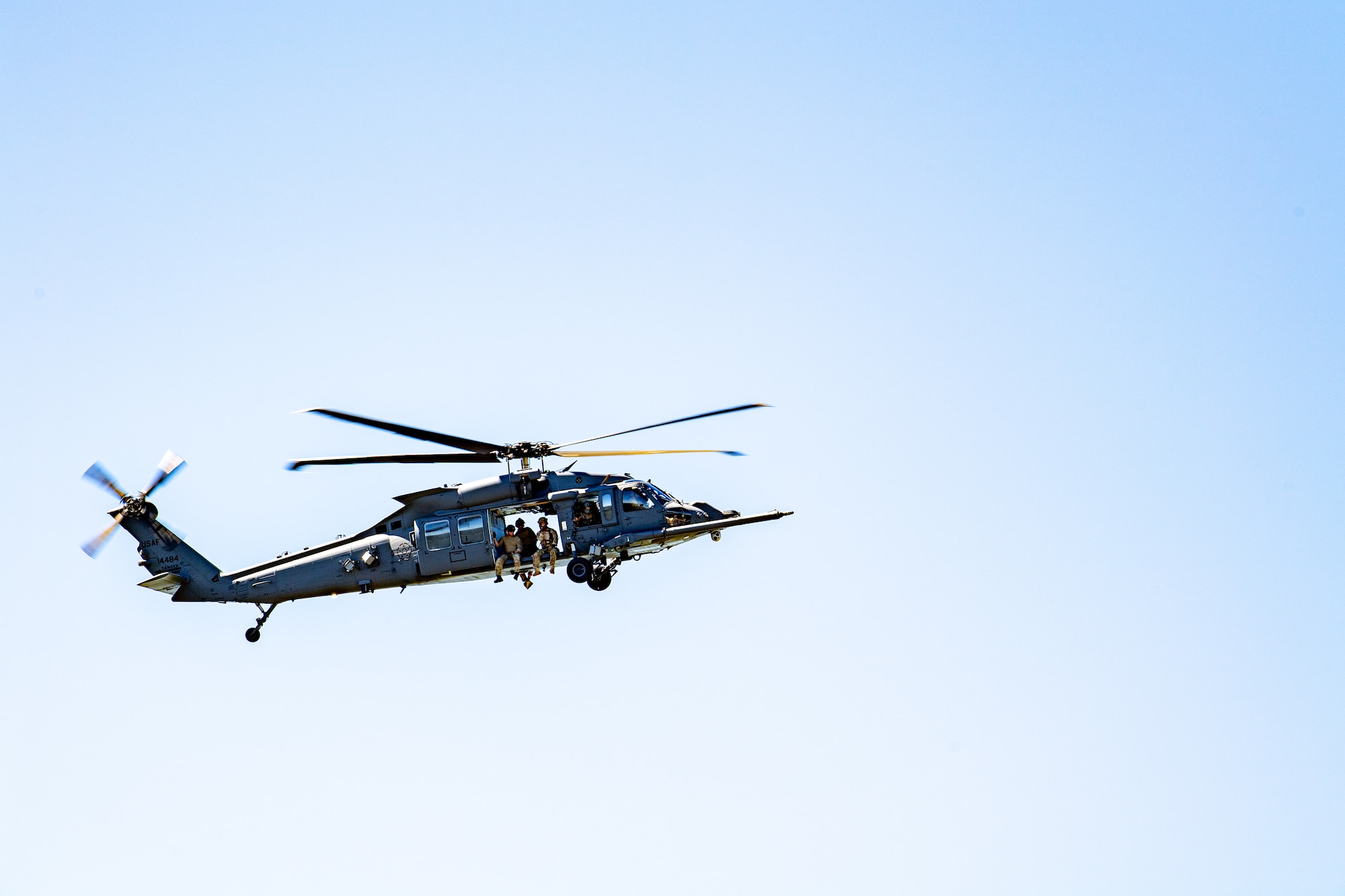 Photo of helicopter flying through the sky