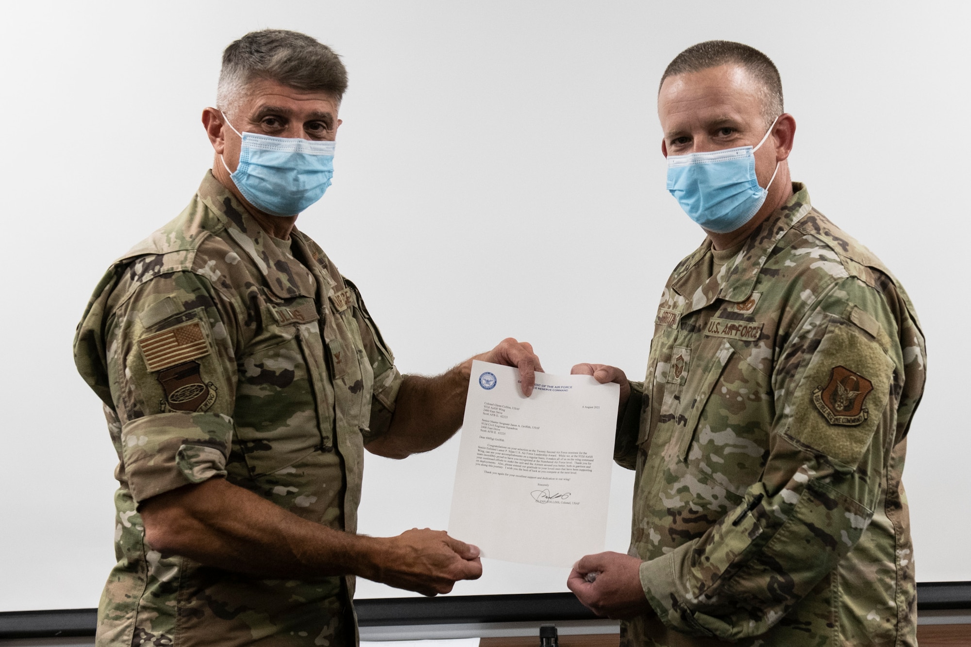 SMSgt. Jason Griffith, 932nd Civil Engineering Squadron, operations superintendent, receives the Lance P. Sijan U.S. Air Force Leadership Award presented by Col. Glenn Collins, 932nd Airlift Wing commander, August 8, 2021, Scott Air Force Base, Illinois. Lance P. Sijan U.S. Air Force Leadership Award recognizes the accomplishments of Airmen, both officers and enlisted, who demonstrate the highest qualities of leadership in the performance of their duties and conduct of their lives. (U.S. Air Force video by Staff Sgt. Brooke Spenner)