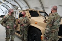 U.S. Army Reserve Col. Andrew T. Love (center), G4 for the U.S. Army Civil Affairs and Psychological Operations Command (Airborne) briefs Deputy Commanding General for U.S. Army Reserve Command, Maj. Gen. Gregory J. Mosser (left), and USACAPOC(A) Commanding General, Brig. Gen. Jeffrey C. Coggin (right) on the USACAPOC(A) Joint Light Tactical Vehicle (JLTV) training and fielding program, Aug. 27, 2021. Soldiers from USACAPOC(A) took part in JLTV introduction training Aug. 23-27, 2021, at the command headquarters, Fort Bragg, N.C., as part of initial JLTV fielding for the command.