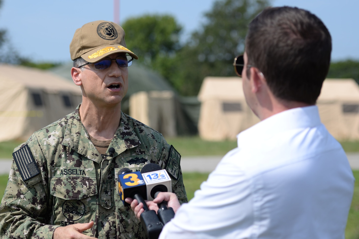Virginia Beach Va. (Aug. 12, 2021) Local media visits Navy Expeditionary Combat Command (NECC) on Joint Expeditionary Base Little Creek - Fort Story during a media event for Large Scale Exercise (LSE 2021). LSE 2021 demonstrates the Navy's ability to employ precise, lethal, and overwhelming force globally across three naval component commands, five numbered fleets, and 17 time zones. LSE 2021 merges live and synthetic training capabilities to create an intense, robust training environment. It will connect high-fidelity training and real-work operations, to build knowledge and skills needed in today's complex, multi-domain, and contested environment. U.S. Navy photo by Mass Communications Specialist 2nd Class Eugene Kretschmer.