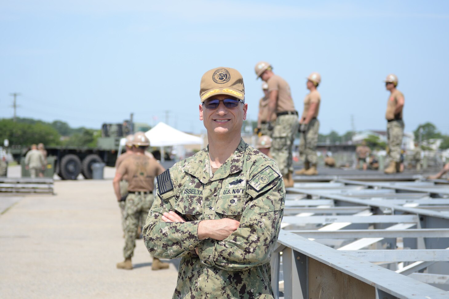 Virginia Beach Va. (Aug. 12, 2021) Deputy for Navy Construction Force, Navy expeditionary Combat Command, Rear Admiral Christopher Asselta USNR, participates in Large Scale Exercise (LSE 2021). LSE 2021 demonstrates the Navy's ability to employ precise, lethal, and overwhelming force globally across three naval component commands, five numbered fleets, and 17 time zones. LSE 2021 merges live and synthetic training capabilities to create an intense, robust training environment. It will connect high-fidelity training and real-work operations, to build knowledge and skills needed in today's complex, multi-domain, and contested environment. U.S. Navy photo by Mass Communications Specialist 2nd Class Eugene Kretschmer.