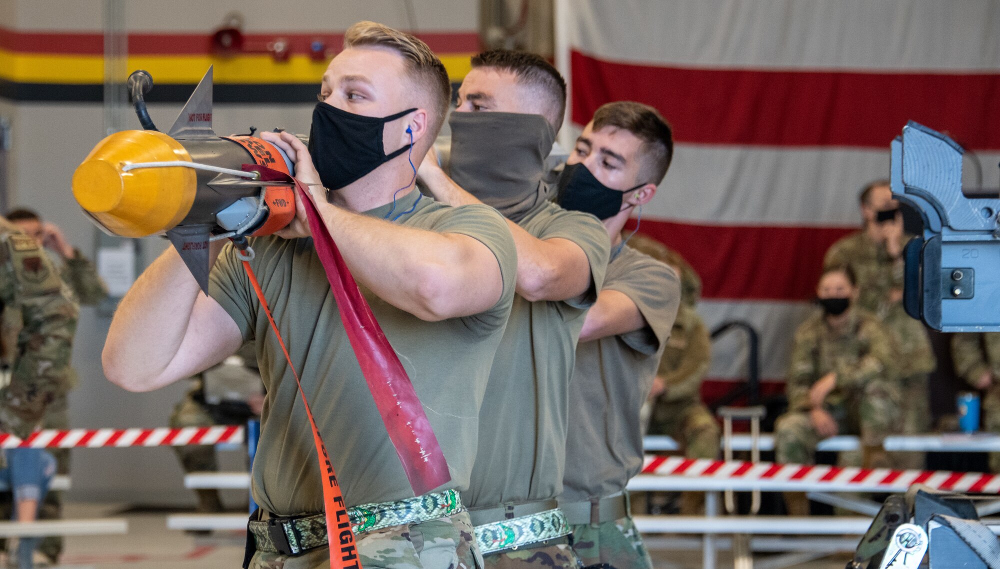 Reservists from the 419th Aircraft Maintenance Squadron prepared to attach an unarmed AIM-9X missile to an F-35A Lightning II during a weapons load competition at Hill Air Force Base, Utah on Sept. 24, 2021. The quarterly competition focuses on speed, accuracy, and safety, ensuring standard loading procedures and proficiency across the wings. (U.S. Air Force photo by Senior Airman Erica Webster)