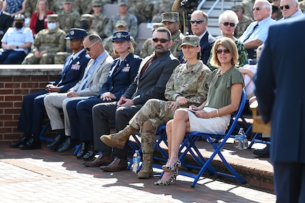 Joint Base Anacostia-Bolling and 11th Wing leaders and their family members listen during a change of command ceremony at JBAB, Washington, D.C., Sept. 28, 2021. Col. Cat Logan assumed command of JBAB and the 11th Wing from Col. Mike Zuhlsdorf, making her the first female commander of the wing and the second commander of the unit since the Air Force wing took control of the installation in the Department of Defense’s first-ever joint base lead service transfer in 2020. (U.S. Air Force photo by Staff Sgt. Kayla White)