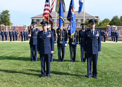 U.S. Air Force Maj. Gen. Joel D. Jackson, Air Force District of Washington and the 320th Air Expeditionary Wing commander, left, stands with Col. Mike Zuhlsdorf, outgoing JBAB and 11th Wing commander, during a change of command ceremony at Joint Base Anacostia-Bolling, Washington, D.C., Sept. 28, 2021. Zuhlsdorf commanded JBAB and the 11th Wing during the Department of Defense’s first-ever joint base lead service transfer in 2020, during which the Air Force took control of the installation from the Navy. Zuhlsdorf relinquished command to incoming commander Col. Cat Logan. (U.S. Air Force photo by Staff Sgt. Kayla White)