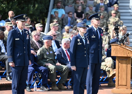 U.S. Air Force Col. Cat Logan, incoming commander of Joint Base Anacostia-Bollinga and the 11th Wing, stands between outgoing commander Col. Mike Zuhlsdorf, right, and Air Force District of Washington and 320th Air Expeditionary Wing Commander Maj. Gen. Joel Jackson, left, during a change of command ceremony at JBAB, Washington, D.C., Sept. 28, 2021. Logan took command from Col. Mike Zuhlsdorf, making her the first female commander of JBAB and the 11th Wing and the second commander of wing at JBAB since the Air Force wing took authority of the installation during the Department of Defense’s first-ever joint base service lead transfer in 2020. (U.S. Air Force photo by Staff Sgt. Kayla White)