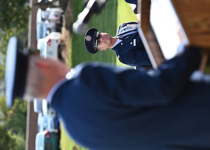 U.S. Air Force Maj. Gen. Joel D. Jackson, Air Force District of Washington and the 320th Air Expeditionary Wing commander, left, highlights the accomplishments of Col. Mike Zuhlsdorf, outgoing Joint Base Anacostia-Bolling and 11th Wing commander during a change of command ceremony at Joint Base Anacostia-Bolling, Washington, D.C. on Sept. 28, 2021. Zuhlsdorf commanded JBAB and the 11th Wing during the Department of Defense’s first-ever joint base lead service transfer in 2020, during which the Air Force took control of the installation from the Navy. Zuhlsdorf relinquished command to incoming commander Col. Cat Logan. (U.S. Air Force photo by Staff Sgt. Kayla White)