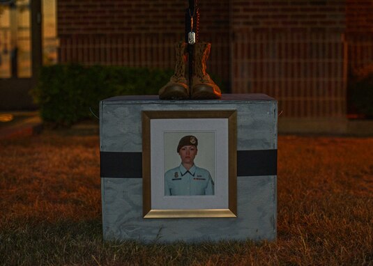 The Airman 1st Class Elizabeth Jacobson memorial outside the 17th Security Forces Squadron on Goodfellow Air Force Base, Texas, Sept. 28, 2021. The base’s Jacobson Gate off of S. Chadbourne Street was renamed to honor Jacobson. (U.S. Air Force photo by Senior Airman Ashley Thrash)