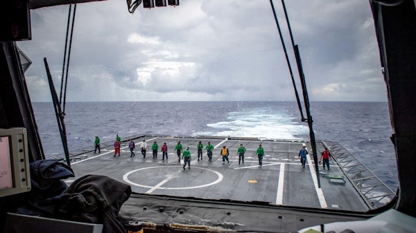 USS Charleston Sailors Conduct FOD Walk Down