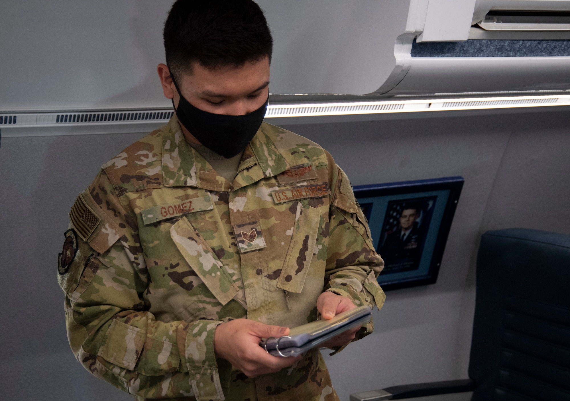 Student checks flight attendant checklist