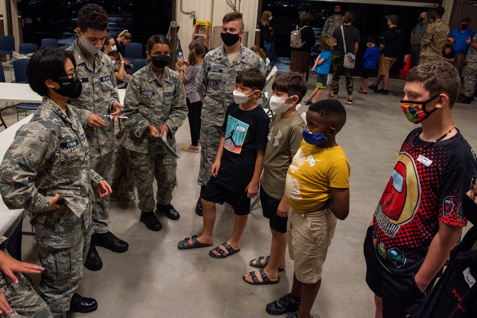 Members of Civil Air Patrol Unit 2801 speak with potential new members