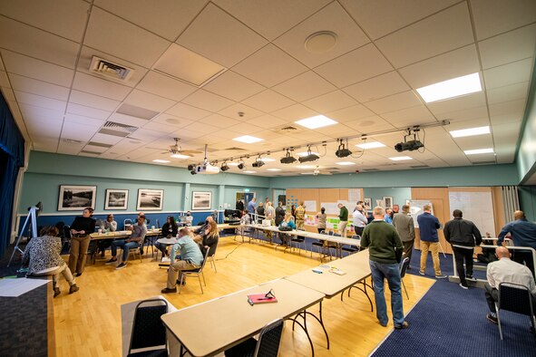 Emergency Management professionals collaborate during an Operational Planning team meeting at RAF Alconbury, England, Sept. 28, 2021. The meeting was intended to provide a foundation and framework for command & control operations and reporting within the 501st Combat Support Wing as well as critical communication connection to mission partners. During the meeting EM members worked together to develop an organizational C2 process that establishes a defined wing-wide network across all 501 CSW installations and organizations including mission partners and geographically separated units. (U.S. Air Force photo by Senior Airman Eugene Oliver)