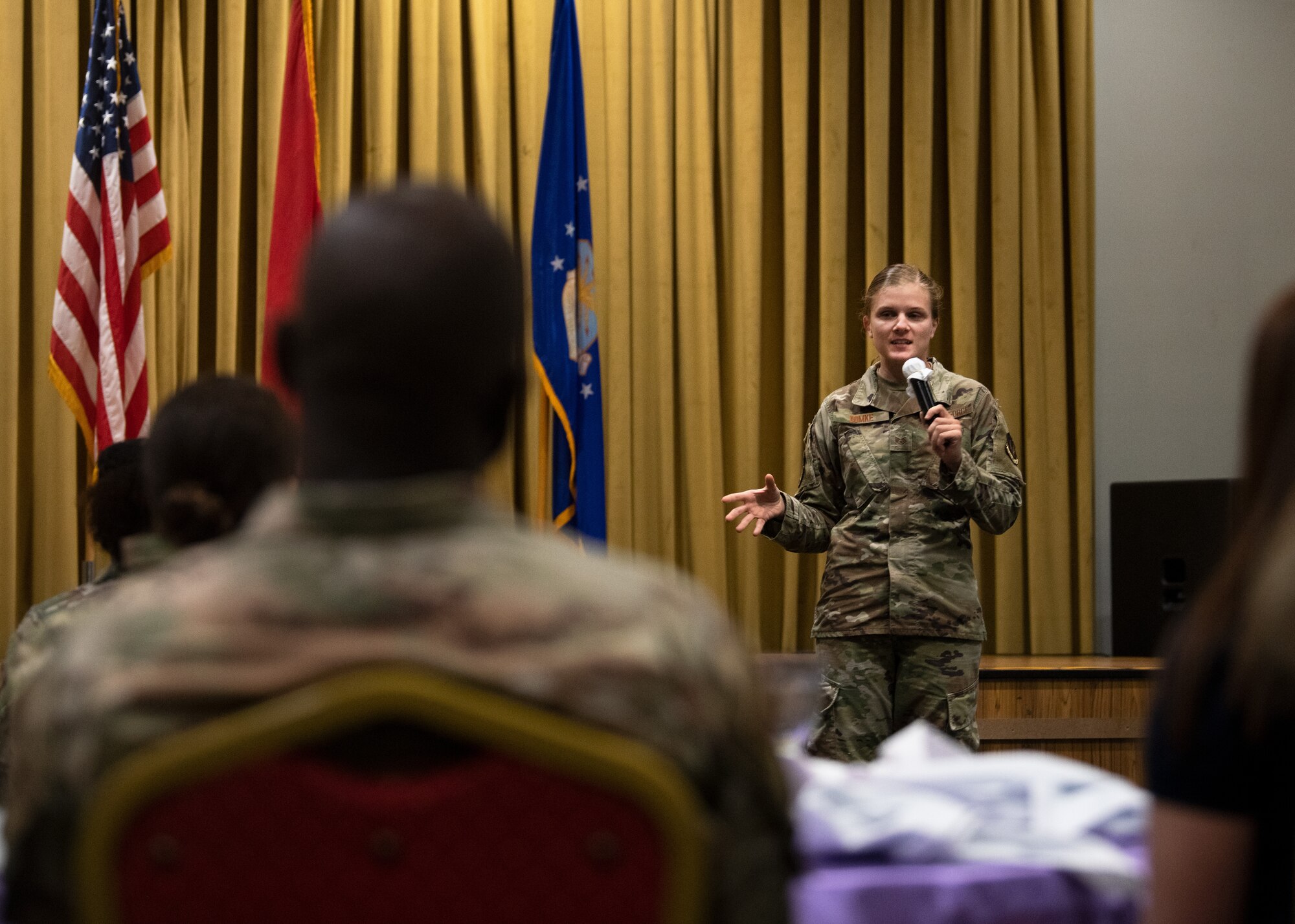 woman speaks and shares her story of resiliency at Incirlik’s National Suicide Prevention Week Brunch at Incirlik Air Base, Turkey