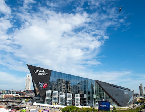 A C-130 Hercules from the 133rd Airlift Wing conducts a flyover at the Minnesota Vikings home opener game in Minneapolis, Minnesota, Sept. 26, 2021.