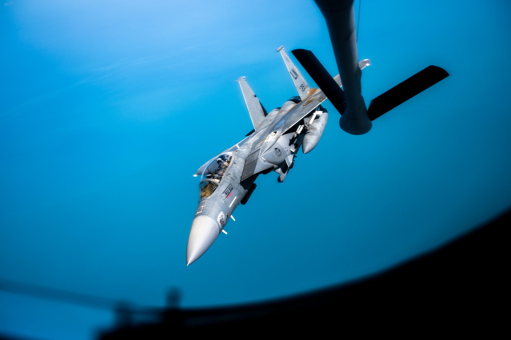 An F-15E Strike Eagle assigned to the 494th Expeditionary Fighter Squadron receives fuel from a KC-135 Stratotanker assigned to the 93rd Expeditionary Air Refueling Squadron