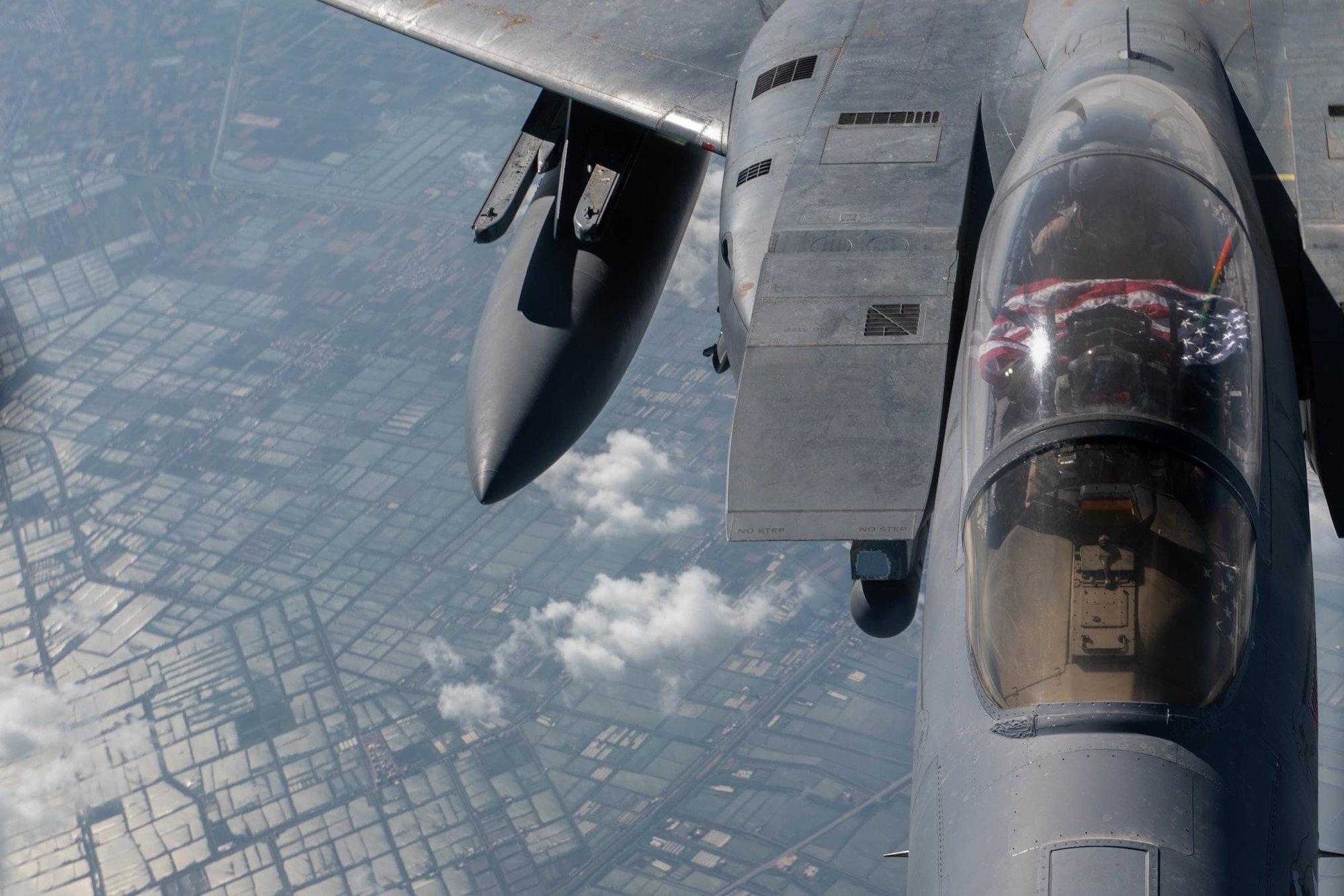 A U.S. Air Force F-15E Strike Eagle assigned to the 494th Expeditionary Fighter Squadron receives fuel from a KC-135 Stratotanker