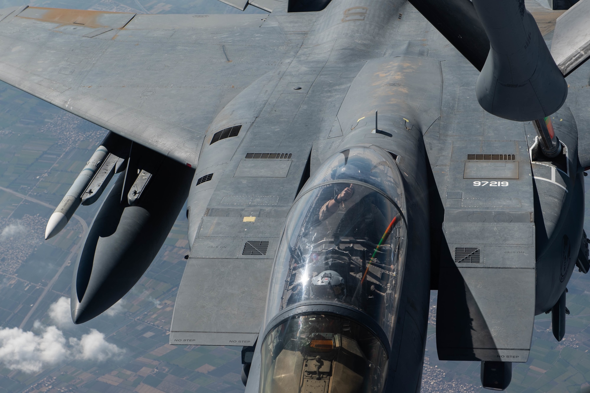 A U.S. Air Force F-15E Strike Eagle assigned to the 494th Expeditionary Fighter Squadron receives fuel from a KC-135 Stratotanker assigned to the 93rd Expeditionary Air Refueling Squadron in support of Bright Star 21