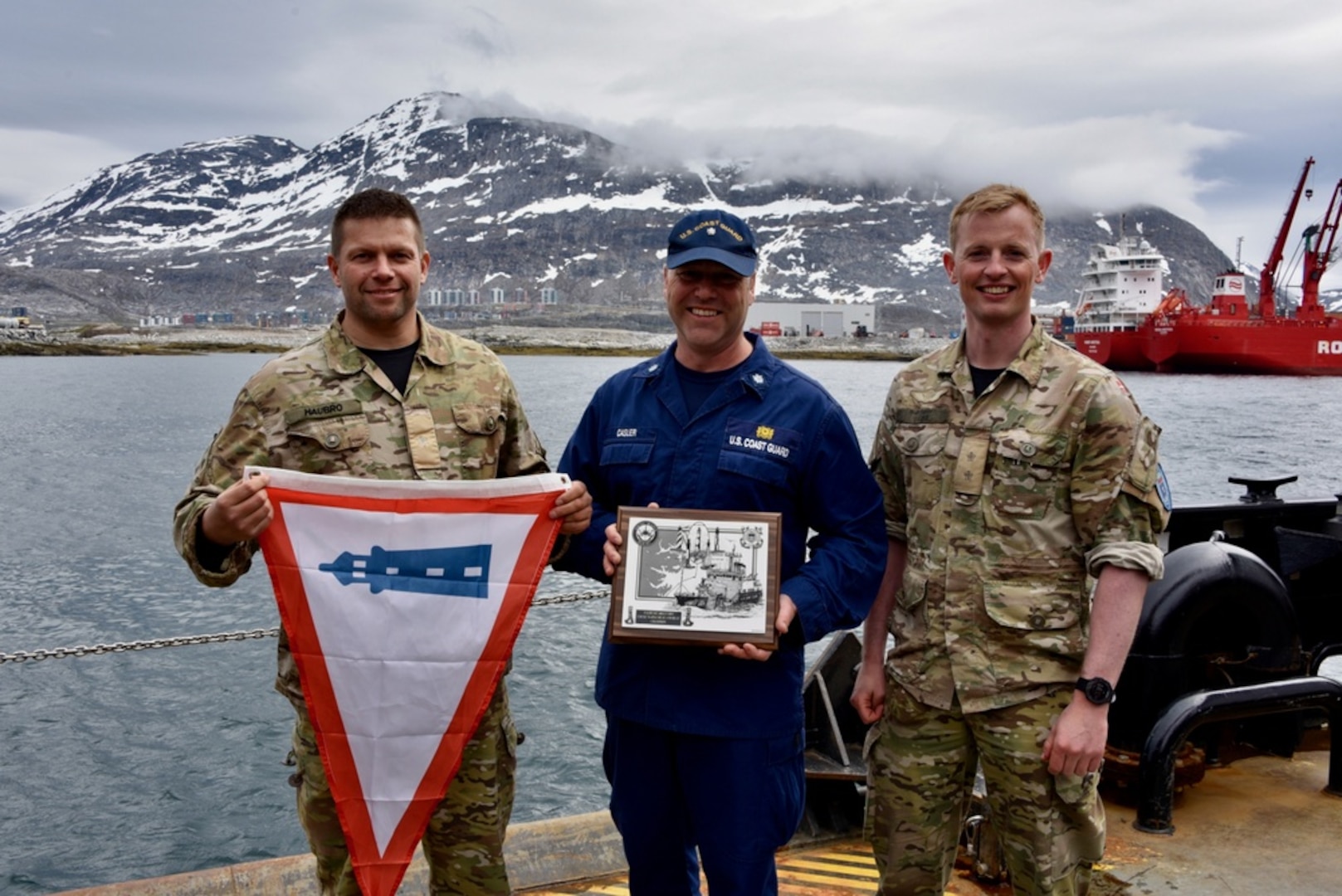The Coast Guard Cutter Maple hosts an international “Heat and Beat” competition on the buoy deck in Greenland, June 25, 2021. Joint Arctic Command representatives, along with Cmdr. Eric Casler, won the competition with the fastest time and flattest pin. (U.S. Coast Guard photo by Petty Officer 3rd Class Jose Hernandez)