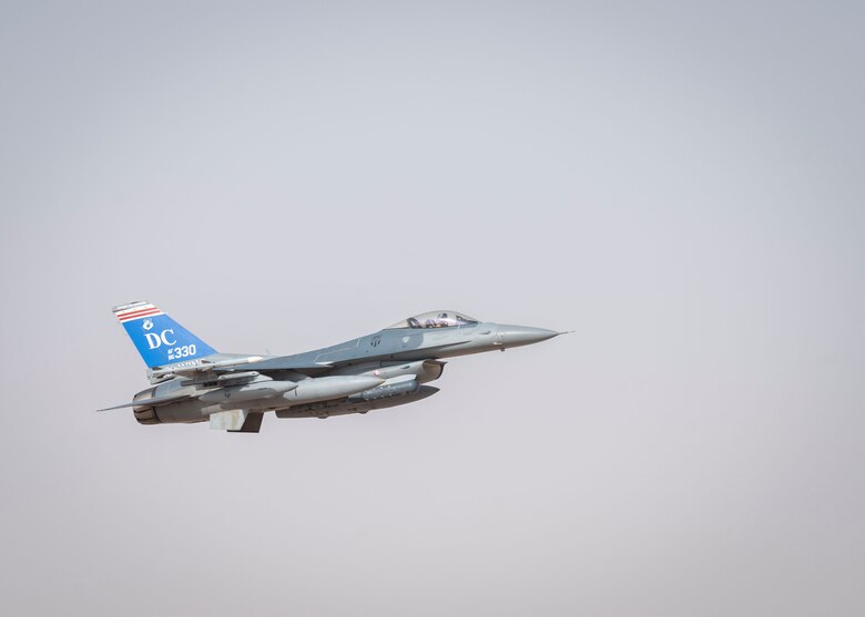 A U.S. Air Force F-16 Fighting Falcon assigned to the 121st Expeditionary Fighter Squadron takes off from the runway at Prince Sultan Air Base, Kingdom of Saudi Arabia, prior to flying to Al Udeid Air Base, Qatar, for Exercise Sky Shield III,  July 31, 2021. Sky Shield is a bilateral defensive counter air and combat search and rescue exercise designed to validate U.S. Air Forces Central and Qatar Emiri Air Force’s combined capability to defend regional airspace. The event allowed the 378th Air Expeditionary Wing to demonstrate its agile combat employment capabilities of repositioning forces in various locations and rapidly generating combat airpower. (U.S. Air Force photo by Staff Sgt. Caleb Pavao)