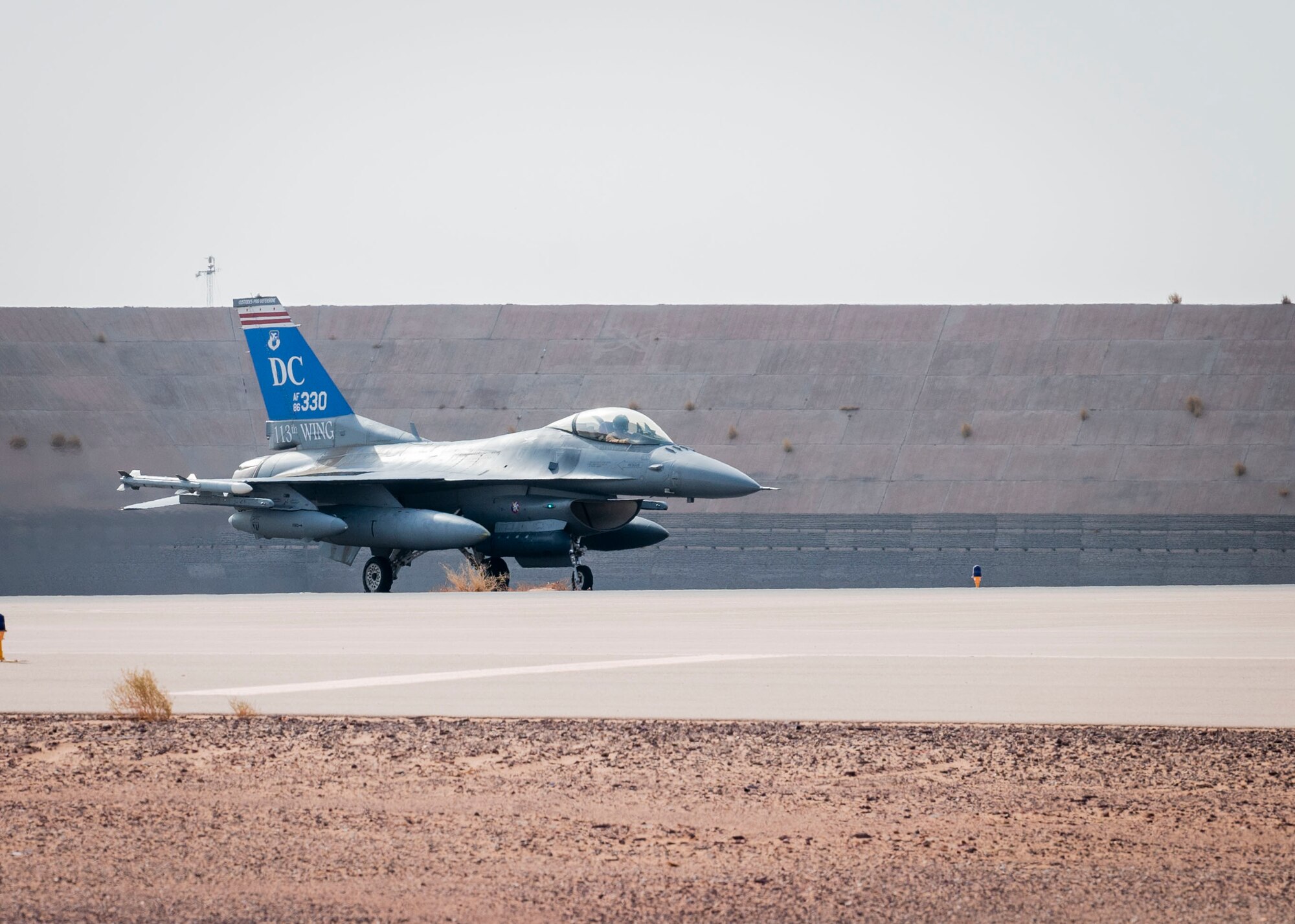 A U.S. Air Force F-16 Fighting Falcon assigned to the 121st Expeditionary Fighter Squadron taxis to the runway at Prince Sultan Air Base, Kingdom of Saudi Arabia, prior to flying to Al Udeid Air Base, Qatar for Exercise Sky Shield III, July 31, 2021. Sky Shield is a bilateral defensive counter air and combat search and rescue exercise designed to validate U.S. Air Forces Central and Qatar Emiri Air Force’s combined capability to defend regional airspace. The event allowed the 378th Air Expeditionary Wing to demonstrate its agile combat employment capabilities of repositioning forces in various locations and rapidly generating combat airpower. (U.S. Air Force photo by Staff Sgt. Caleb Pavao)