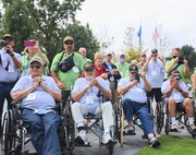 One hundred and fifteen Honor Flight Chicago veterans watch as the U.S. Air Force Honor Guard Drill Team performs at the Air Force Memorial, Arlington, Va., Sept. 16, 2021. The Honor Flight Network offers American military veterans free transportation to the nation's memorials in Washington, D.C. The group was made up of veterans of World War II, the Korean War, and the Vietnam War.  (U.S. Air Force photo by Brian Nestor)