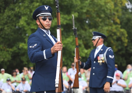 Airmen 1st Class Isaiah Vega, U.S. Air Force Honor Guard Drill Team ceremonial guardsman, performs for veterans escorted by Honor Flight Chicago at the Air Force Memorial, Arlington, Va., Sept. 16, 2021. The Honor Flight Network offers American military veterans free transportation to the nation's memorials in Washington, D.C. The group was made up of veterans of World War II, the Korean War, and the Vietnam War. (U.S. Air Force photo by Brian Nestor)