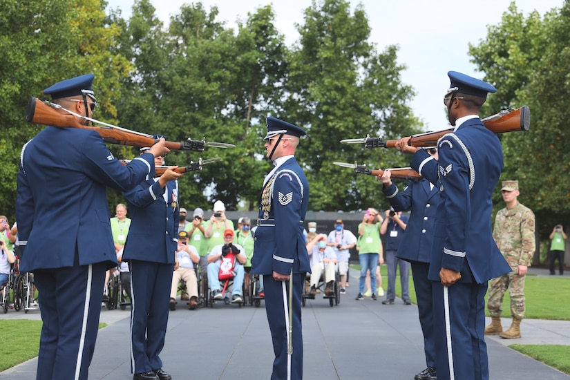 U.S. Air Force Honor Guard Drill Team members perform for Honor Flight Chicago veterans at the Air Force Memorial, Arlington, Va., Sept. 16, 2021. The Honor Flight Network offers American military veterans free transportation to the nation's memorials in Washington, D.C. The group was made up of veterans of World War II, the Korean War, and the Vietnam War.