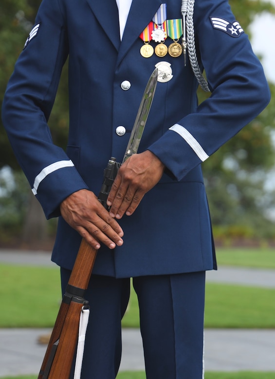 Senior Airman Phillip Reyes, U.S. Air Force Honor Guard Drill Team ceremonial guardsman, performs for Honor Flight Chicago veterans at the Air Force Memorial, Arlington, Va., Sept. 16, 2021. The Honor Flight Network offers American military veterans free transportation to the nation's memorials in Washington, D.C. The group was made up of veterans of World War II, the Korean War, and the Vietnam War. (U.S. Air Force photo by Brian Nestor)