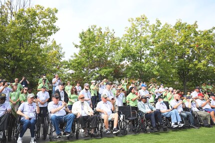 One hundred and fifteen Honor Flight Chicago veterans watch as the U.S. Air Force Honor Guard Drill Team performs at the Air Force Memorial, Arlington, Va., Sept. 16, 2021 The Honor Flight Network offers American military veterans free transportation to the nation's memorials in Washington, D.C. The group was made up of veterans of World War II, the Korean War, and the Vietnam War.  (U.S. Air Force photo by Brian Nestor)