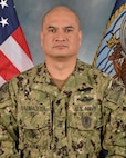 Photo in Type III uniform of CBCM (SCW/FMF) Robert R. Balmaceda, senior enlisted leader, Navy Expeditionary Combat Command.