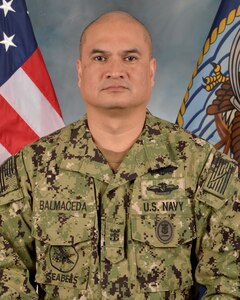 Photo in Type III uniform of CBCM (SCW/FMF) Robert R. Balmaceda, senior enlisted leader, Navy Expeditionary Combat Command.