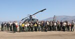 U.S. Army Soldiers from 23rd Brigade Engineer Battalion, 1-2 Stryker Brigade Combat Team, assigned to Joint Base Lewis-McChord, Washington, pose for a group photo at Nervino Helibase in front of a civilian aircraft used to carry supplies to and from fires in support of the Department of Defense wildland firefighting response on the Dixie Fire in Plumas National Forest, California, Sept. 14, 2021. U.S. Army North, U.S. Northern Command’s Joint Force Land Component Command remains committed to providing flexible DoD support to the National Interagency Fire Center to respond quickly and effectively to assist our local, state, and federal partners in protecting people, property, and public lands.