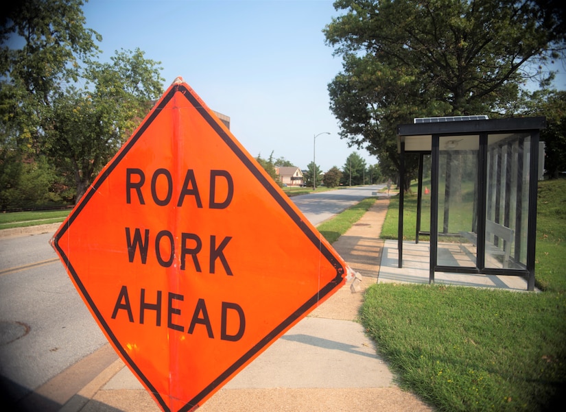 A “road work ahead” sign on the sidewalk ahead of Theisen Street near the Bolling Club at Joint Base Anacostia-Bolling, Sept 13, 2021.