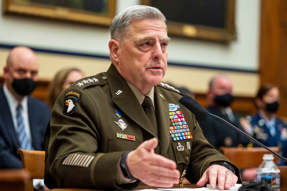A military officer speaks at a hearing.