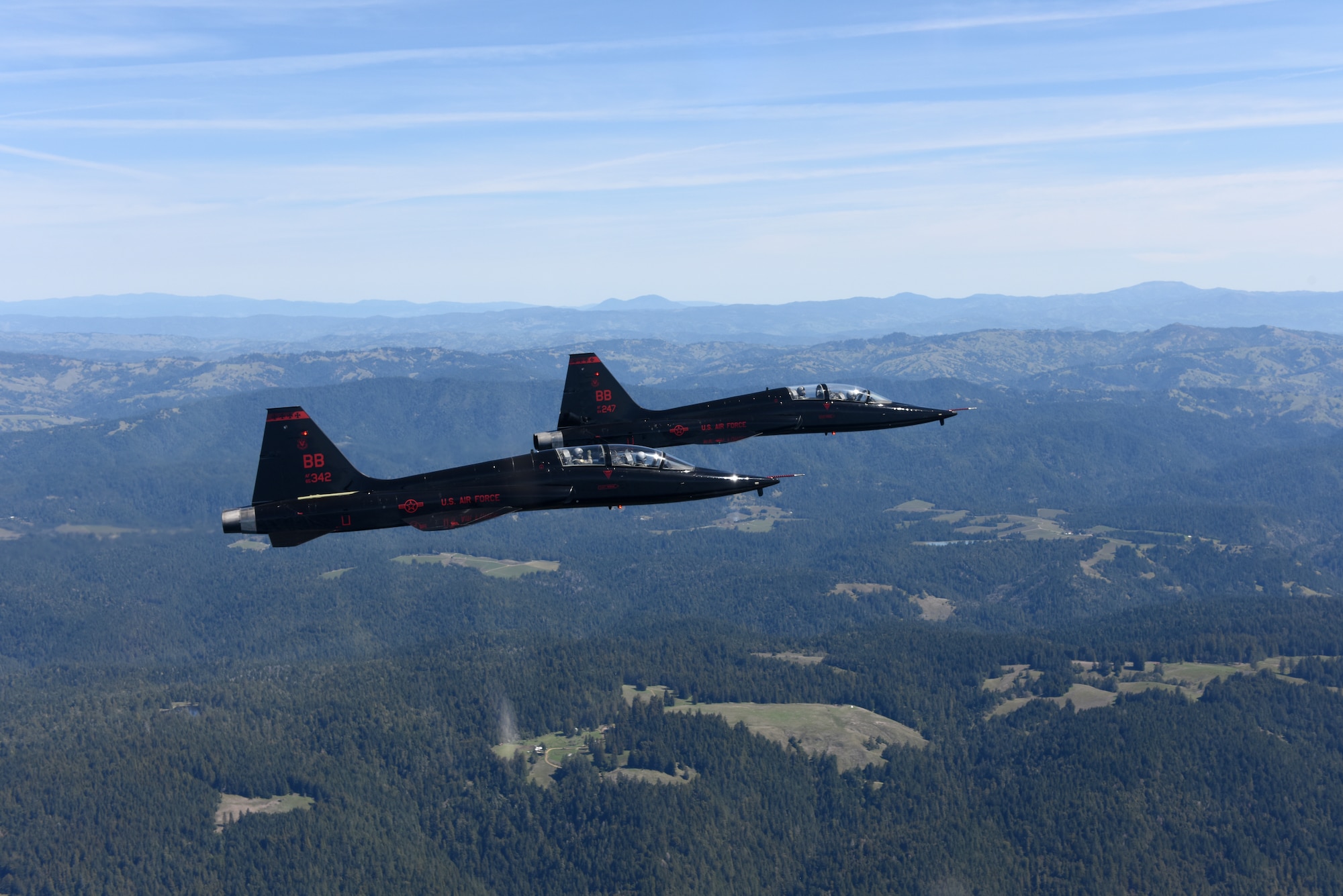 Two T-38s from Beale Air Force Base, California, fly in formation over Northern California