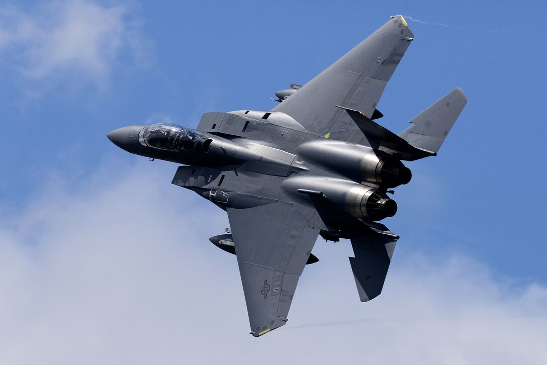 An F-15E Strike Eagle assigned to the 492nd Fighter Squadron flies over Royal Air Force Lakenheath
