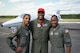 U.S. Air Force Capt. Sidney Ganison, stands next to Capt. Kyle Green and Capt. Johnny Frye (left to right), C-21 pilots, 458th Airlift Squadron, Scott Air Force Base, Illinois, during a trip to Tuskegee, Alabama, Sept. 28, 2021. The group made history as being the first all-African American crew to land the C-21 at Alabama's historic Tuskegee Airfield. (U.S. Air Force photo by 1st Lt. Sam Eckholm)