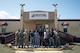 U.S. Air Force pilots and crew from the 458th Airlift Squadron, Scott Air Force Base, Illinois, pose for a photo alongside students from the Red Tail Flight Academy, Tuskegee, Alabama, Sept. 28, 2021. The school’s campus is on the same airfield the legendary Tuskegee Airmen trained at over 80 years ago and trains new students pilots interested in building flight time and learning more about aviation. (U.S. Air Force photo by 1st Lt. Sam Eckholm)